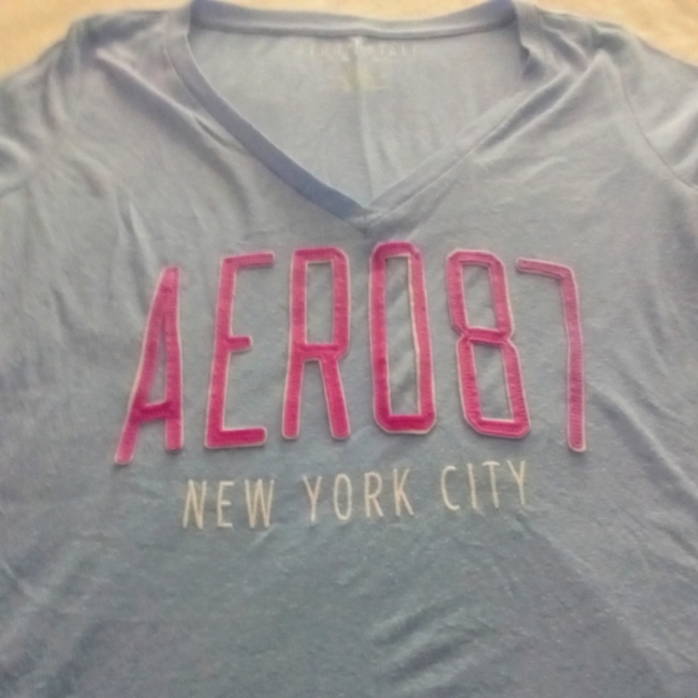 Beautiful blue ladies t-shirt gently used